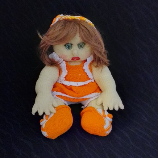 عروسکهای بافتنی نازی با لباس نارنجی