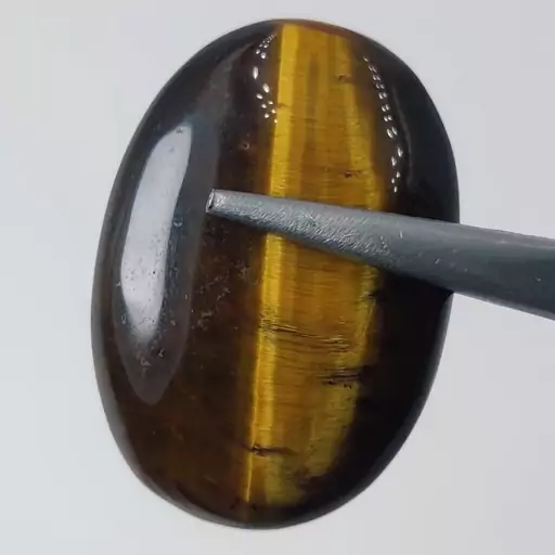 نگین سنگ چشم ببر یا tigers eye معدنی       