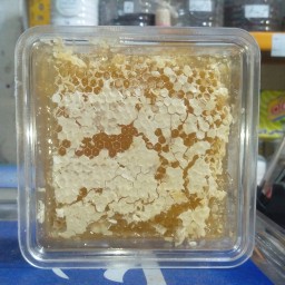 عسل طبیعی با موم زنبور عسل 550 گرم