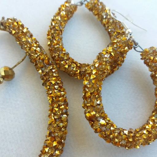 ست دستبند و گوشواره سواروسکی طلایی براق