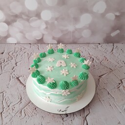 کیک تولد خامه ای زمستانی تم سبز وسفید کیک مدرن ارسال پس کرایه 