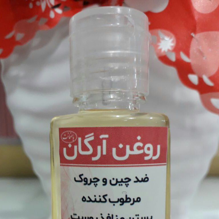 روغن آرگان معطر برند فراطب حجم 30 میل رنگ طلایی 