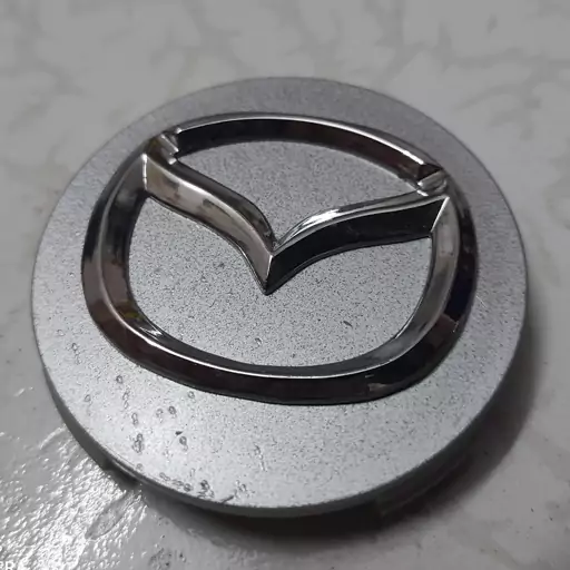 تورینگی مزدا 3 قدیم درپوش وسط رینگ بچه قالپاق مزدا تو رینگی چرخ ماشین مزدایی mazda3 مزدا3 مزدا 3