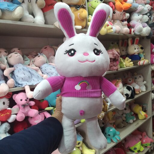 عروسک خرگوش لباس رنگین کمانی