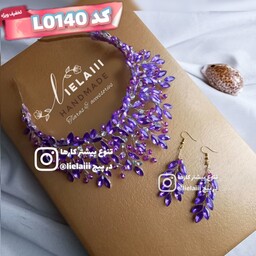 تاج بنفش شیک L0140 تاج فرحی و گوشواره بنفش تاج ملکه ای بنفش تاج عروس ریسه مو تل 