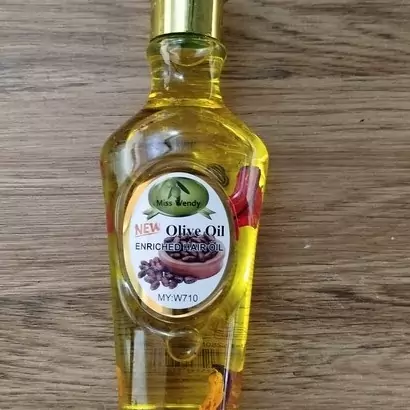 روغن ماساژ خارجی اسانس سیاه دانه و روغن زیتون 280 میل