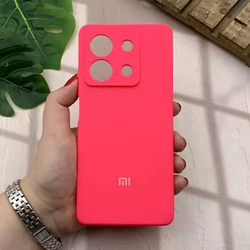 قاب گوشی Redmi Note 13 5G شیائومی سیلیکونی پاک کنی اورجینال داخل پارچه ای رنگ سرخابی محافظ لنز دار کد 75120