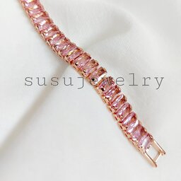 دستبند زنانه طرح جواهر  تنیسی رزگلد رنگ ثابت با نگین صورتی 