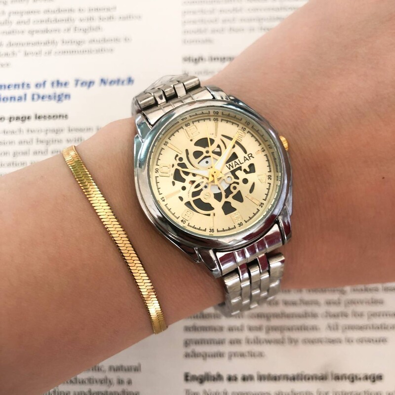 ساعت والار زنانه طرح اتومات بنداستیل نقره ای همراه دستبند طلایی 