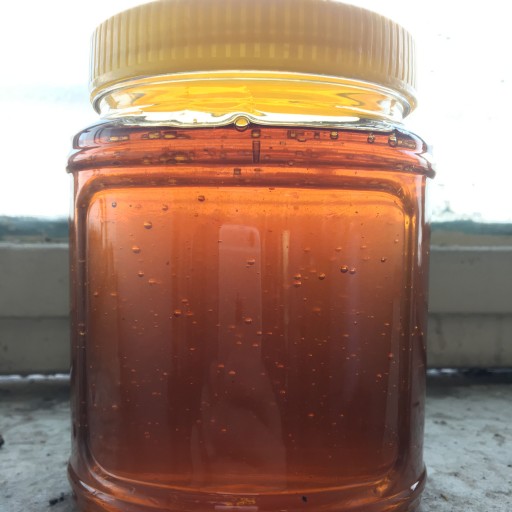 عسل طبیعی گون گز صاف کوه‌های الوند‌ به قیمت عمده ( ساکارز زیر 2)