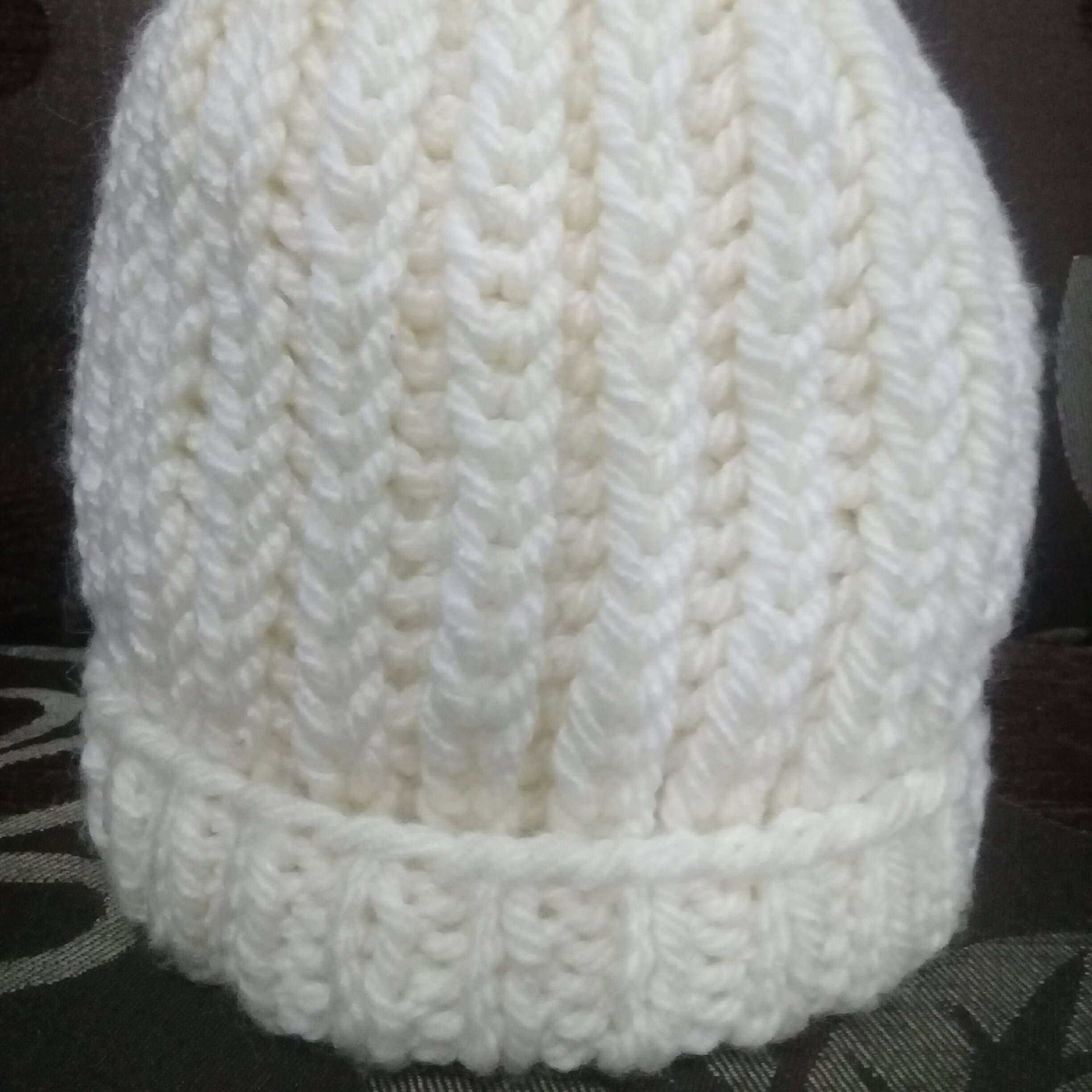 کلاه منگوله دار  بچگانه دست بافت شیری رنگ