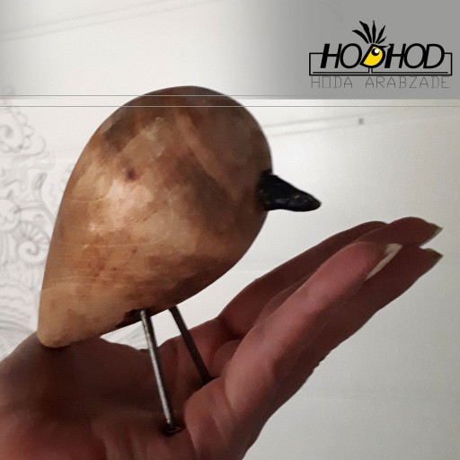 پرنده ی چوبی