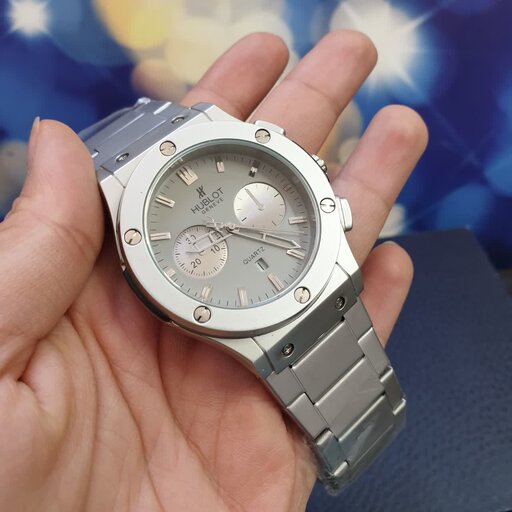 ساعت مردانه و پسرانه طرح هابلوت بند فلزی با گارانتی موتور Hublot 