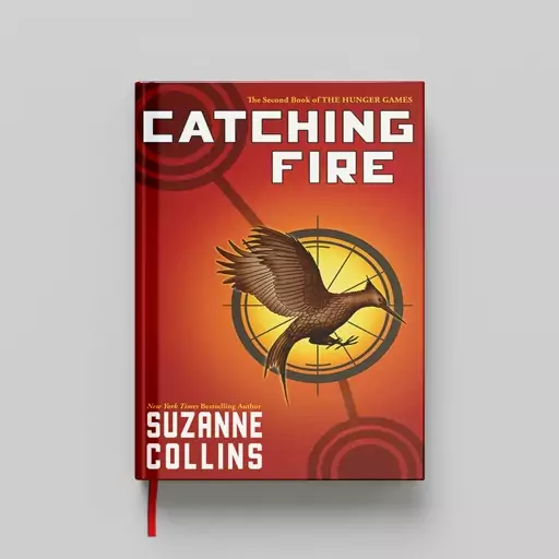 کتاب Catching Fire جلد سخت (HARDCOVER)