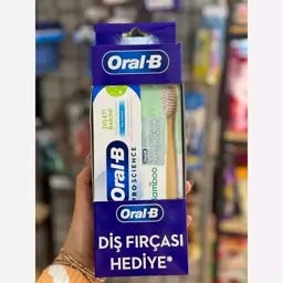 مسواک و خمیردندان اورال بی  oral B اصلی اصلی با چوب بابمو