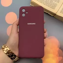 قاب گوشی Galaxy A04E سامسونگ سیلیکونی پاک کنی اورجینال داخل پارچه ای محافظ لنز دار رنگ زرشکی کد 92399