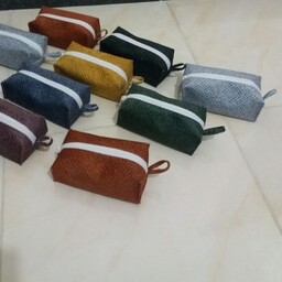 کیف ارایشی پارچه مقاوم و محکم قابل شستشو رنگبندی دارد