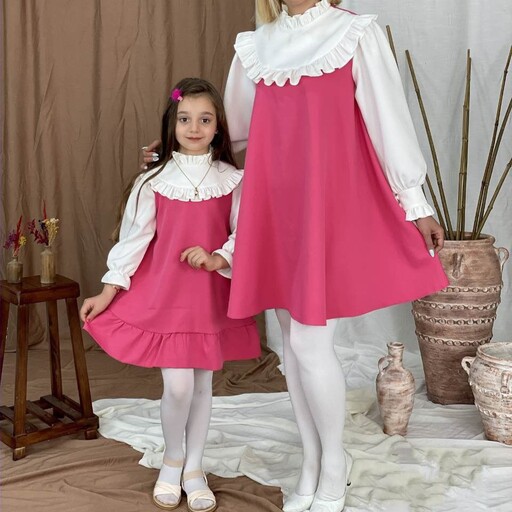 (لباس کودک) ست مادر و دختری یا ست بزرگسال و کودک در 3 سایز  و رنگبندی با جنس کرپ مازراتی درجه یک عیدانه