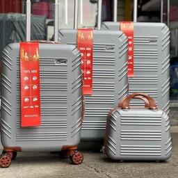 چمدان چهار تیکه ABS برند HOSSONI ، چمدانی چهار تایی خارجی نشکن درجه یک رنگ نقره ای