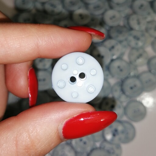 دکمه لباس طرح دایره پلاستیکی رنگ آبی آسمانی بسته 10 عددی 