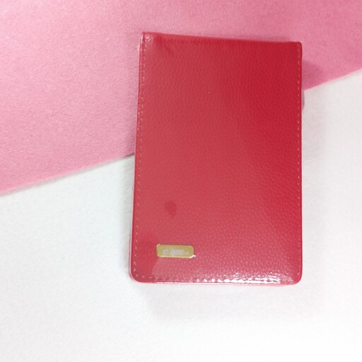 دفترچه یادداشت خبرنگاری سیمی (فنری)، جلد چرمی  دارای جای خودکار ،رنگ قرمز مارک کلیپس خط دار (مشکی)