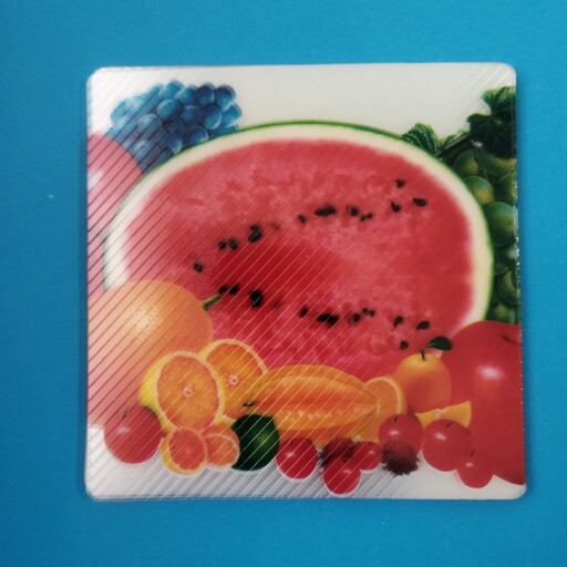 زیر لیوانی پلاستیکی  مربعی طرح میوه ها بسته 12 عددی