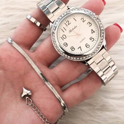 ساعت زنانه  بند استیل نقره ای مارک بالدا به همراه دستبند ماری  نقره ای رنگ ثابت