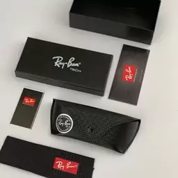 جلد و پک اصلی عینک برند ری بن  Ray Ban Tech  مشکی همراه دستمال برند طبق تصویر