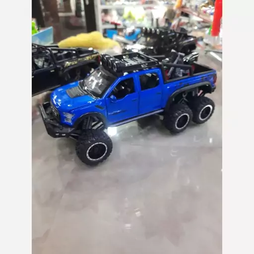 ماکت فلزی وانت فورد رپتور (F150) دوکابین شش در بازشو  همراه با موتور  (Ford raptor f150) شش چرخ موزیکال چراغدار