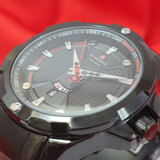 ساعت مردانه نیوی فورس موتور ژاپن رنگ ثابت سیکو بند استیل اصلی شیشه معدنی ضد خش طرح قرمز
Naviforce