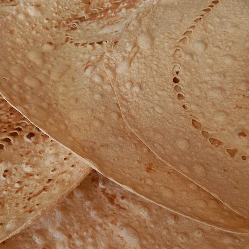 نان پر سبوس دار فراسودمند تهیه شده از آرد کامل محلی در بسته های 15 عددی