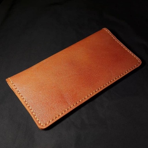 کیف پول کتی مردانه (کاملا دست دوز)
چرم بزی قهوه ای روشن
ابعاد:10×19