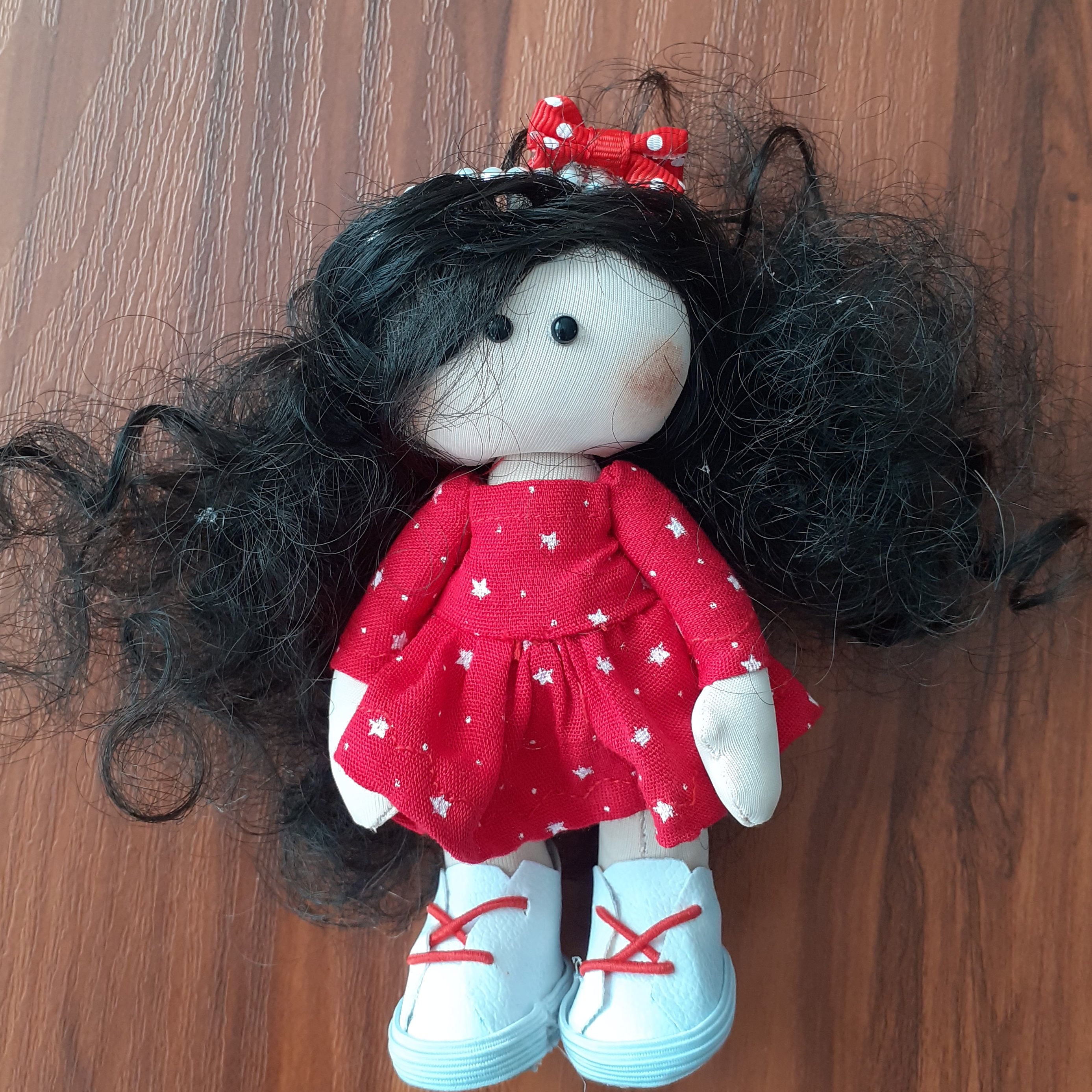 عروسک دست ساز ستاره ای با داشتن تل مروارید