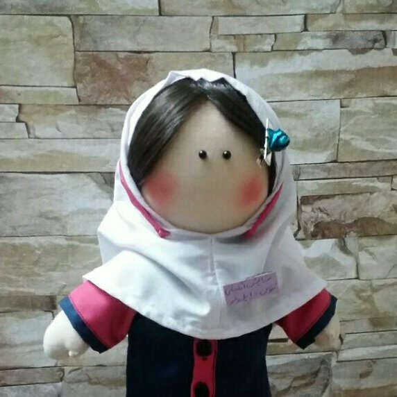 عروسک دانش اموز