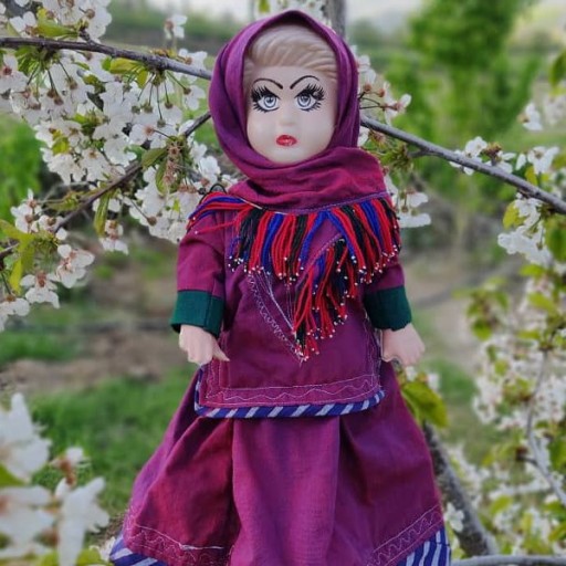 عروسک با لباس محلی مینودشت روستای سرگل اباد