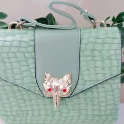کیف مجلسی دخترانه با سگگ روباهی در  دو رنگ سبز کمرنگ و یاسی همراه با بند بلند