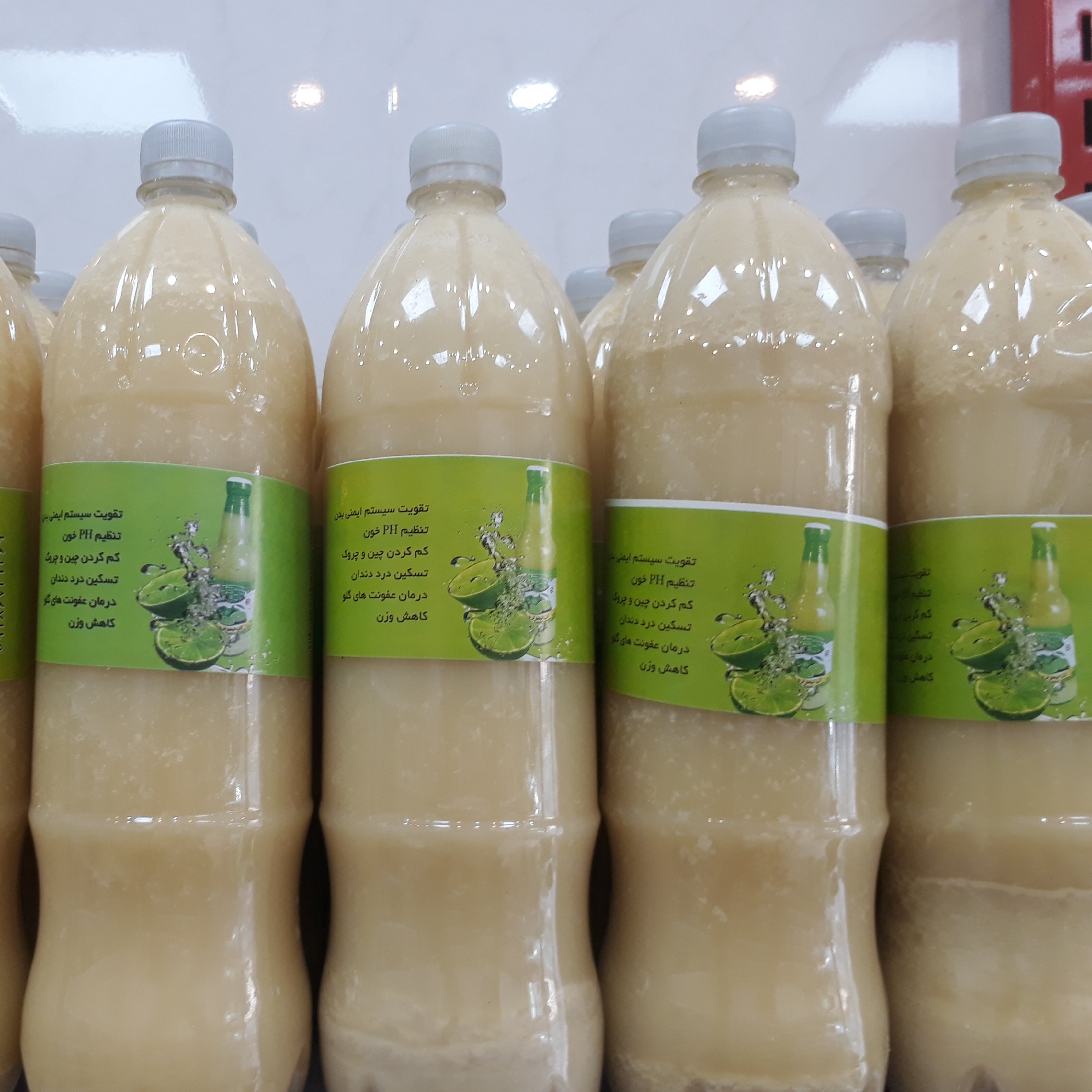 بطری یک لیتری  آبلیمو 100 خالص وخانگی