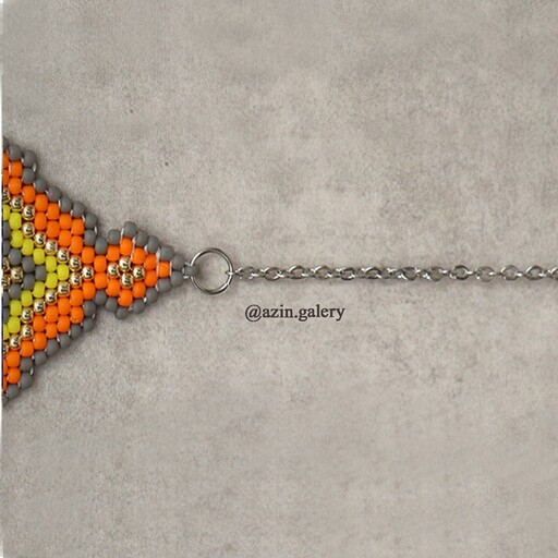 دستبند پیکسلی دستباف با منجوق اصل ژاپن و قطعات فلزی صددر صد استیل و  رنگ ثابت 