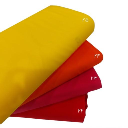 پارچه تترون درنا ساده تک طیف قرمز و نارنجی و زرد عرض 90 سانتی متر طول بر اساس 100 سانتی متر