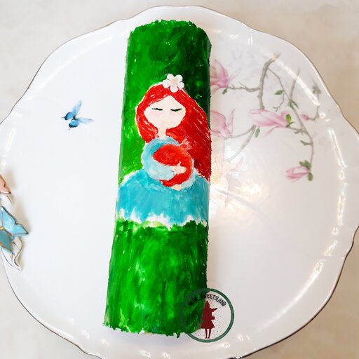 کیک رولت خامه ای نقاشی دخترک یلدایی