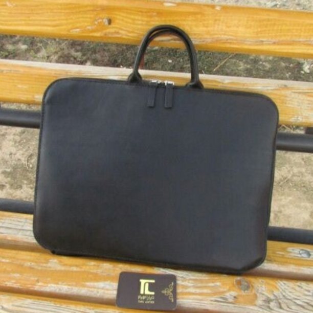 کیف لب تاب چرم طبیعی در جه یک گاوی و دست دوزتیاراچرم مشهد