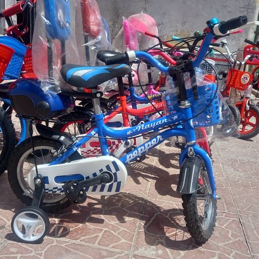 دوچرخه سایز 12 کودک دارای  صندوق پشتی  سبد کمکی زنگ  بدنه فلزی
