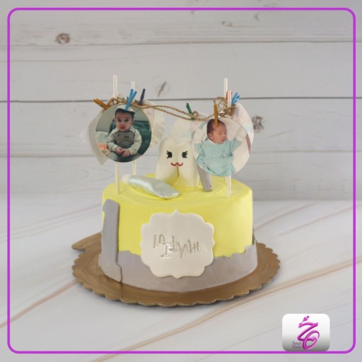 کیک خامه ای دندونی با تزئینات فوندانت
