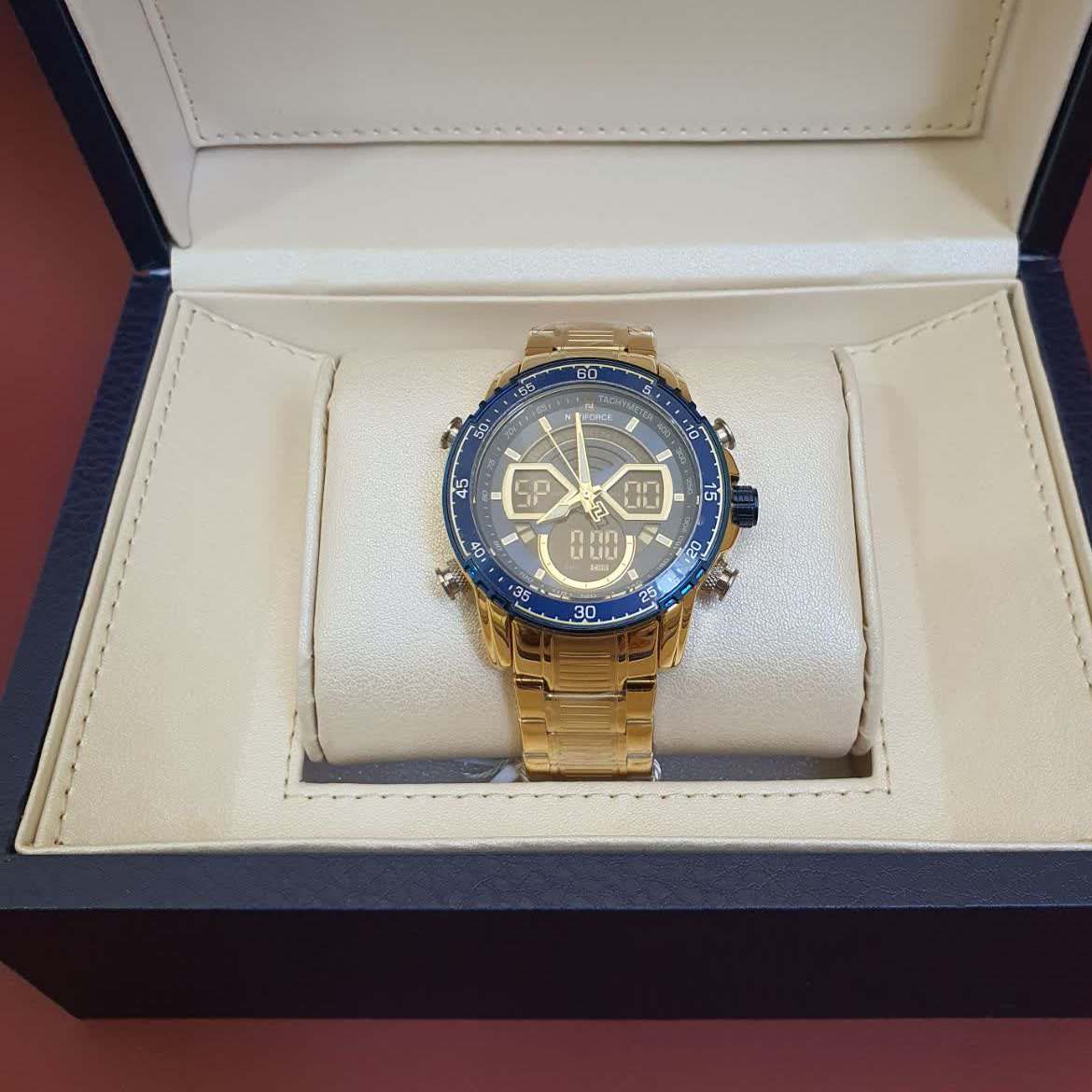 ساعت مچی مردانه ناویفورس اورجینال صفحه آبی بند طلایی Naviforce