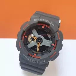 ساعت مچی مردانه کاسیو جیشاک طوسی با حاشیه نارنجی  casio G-shock 