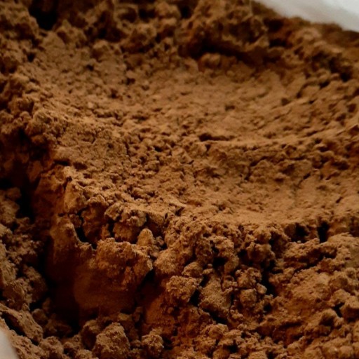 بسته 100 گرمی پودر کاکائو تهیه شده از دانه کاکائو مرغوب