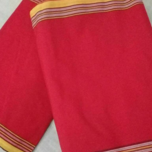 پارچه های سنتی دست بافت ترکمنی،رنگ قرمز با حاشیه زرد،عرض پارچه ها 29 الی 32 سانت متغییر،قیمت هر متر 30 تومن یک قواره 300