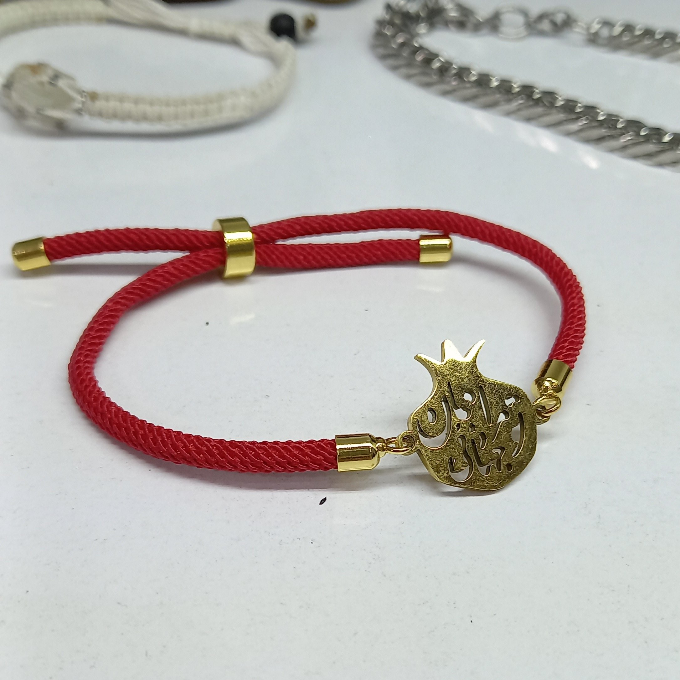 دستبند یلدا انار استیل با متن تو مرا جام جهانی