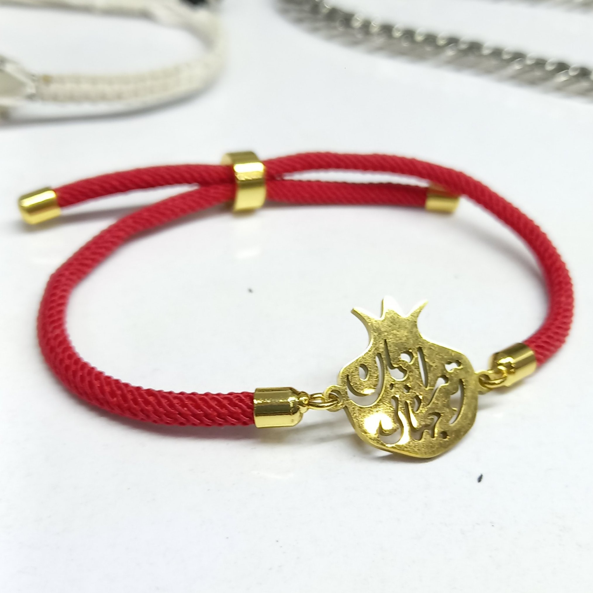 دستبند یلدا انار استیل با متن تو مرا جام جهانی