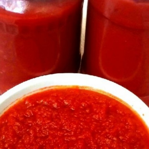 رب گوجه خانگی کم نمک درجه یک پاکتی  ( بی دانه)
